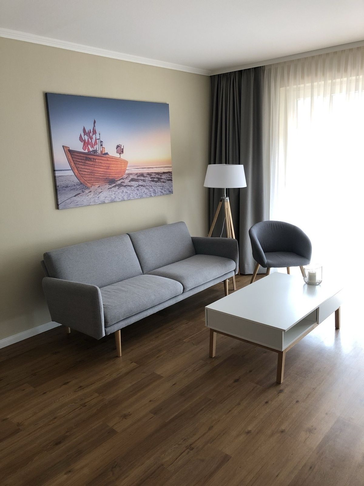 Wohnzimmer mit gemütlicher Schlafcouch